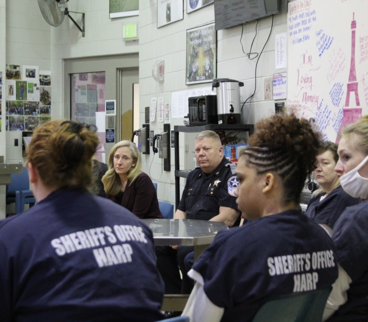 HARP participants sit in a circle during a session