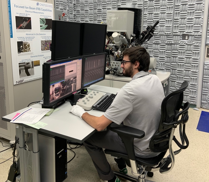 Joseph Wikar working at a computer station