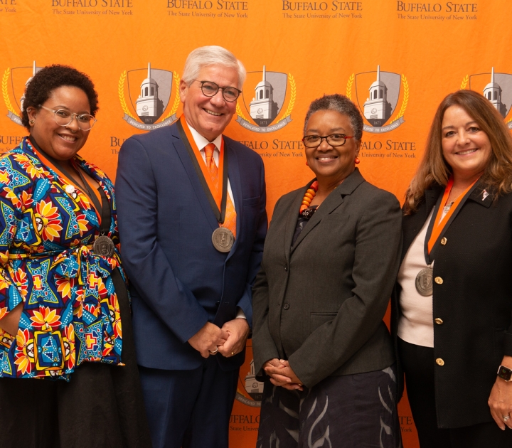 LaStarsha McGarity, Michael Bonitatibus, Katherine Conway-Turner, and Dianne Baumert-Moyik pose for a photo