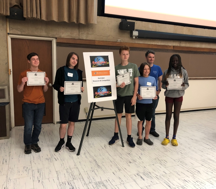 Students from Allendale Columbia HIgh School in Rochester display their certificates