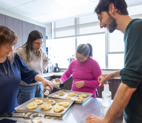 Participants make soft pretzels