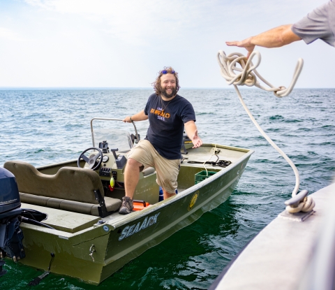 Buffalo State GLC staff working on Lake Erie