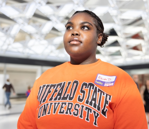 Buffalo State student inside the AKG Art Museum