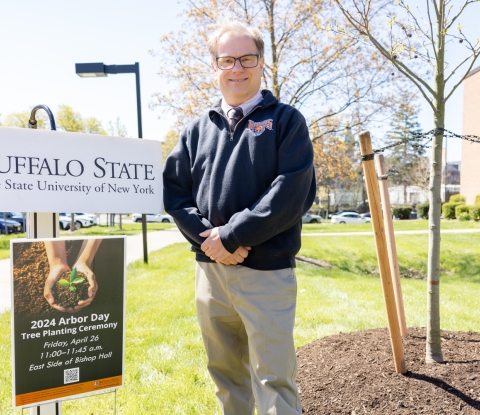 Steven Sypniewski at a Buffalo State Arbor Day tree planting ceremony