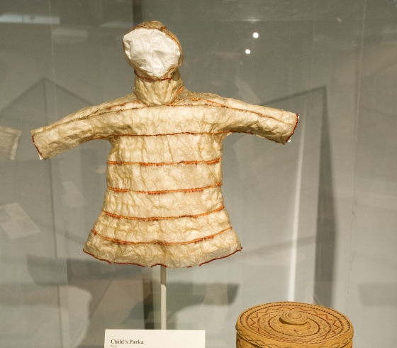 Gutskin parka in museum case