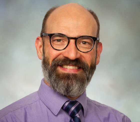 Head shot of Todd Benzin