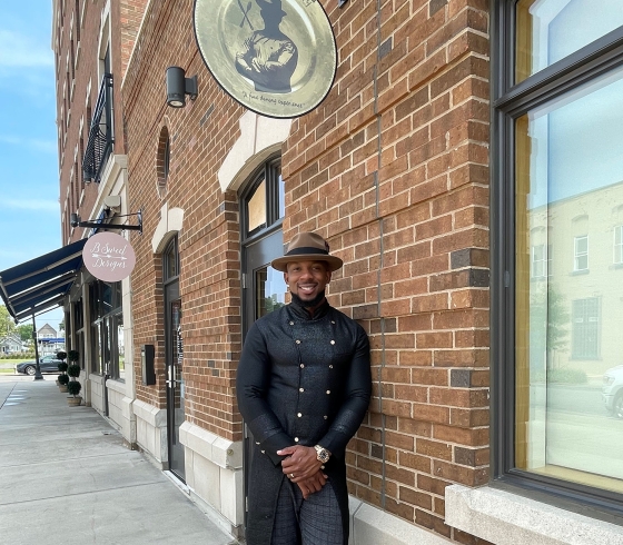 Darian Bryan standing outside the Plating Society