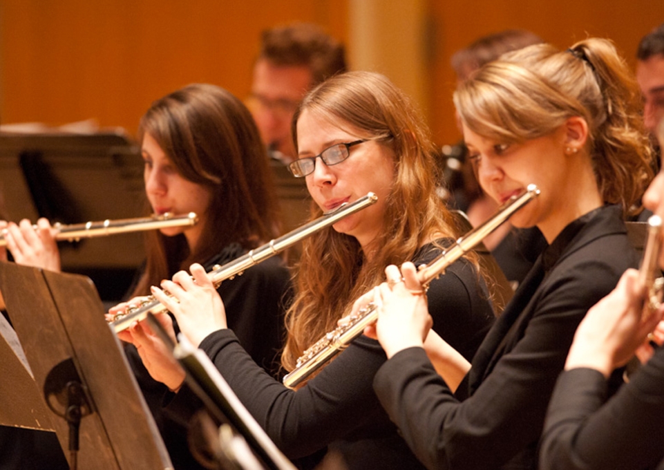 Flutists performing in the Wind Ensemble