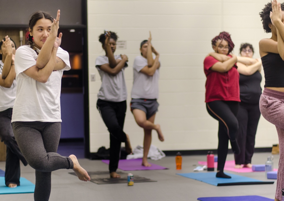 Students in a yoga pose