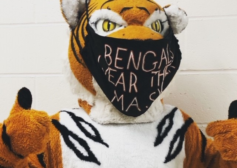 Benji the college mascot donning a face mask