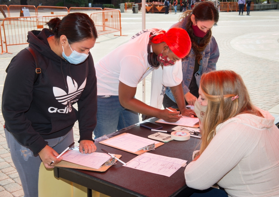Students at a voter registration table