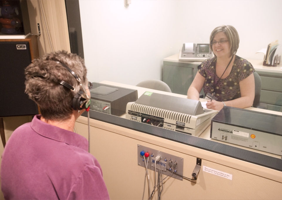 Client in the Speech-Language-Hearing Clinic wearing headphones
