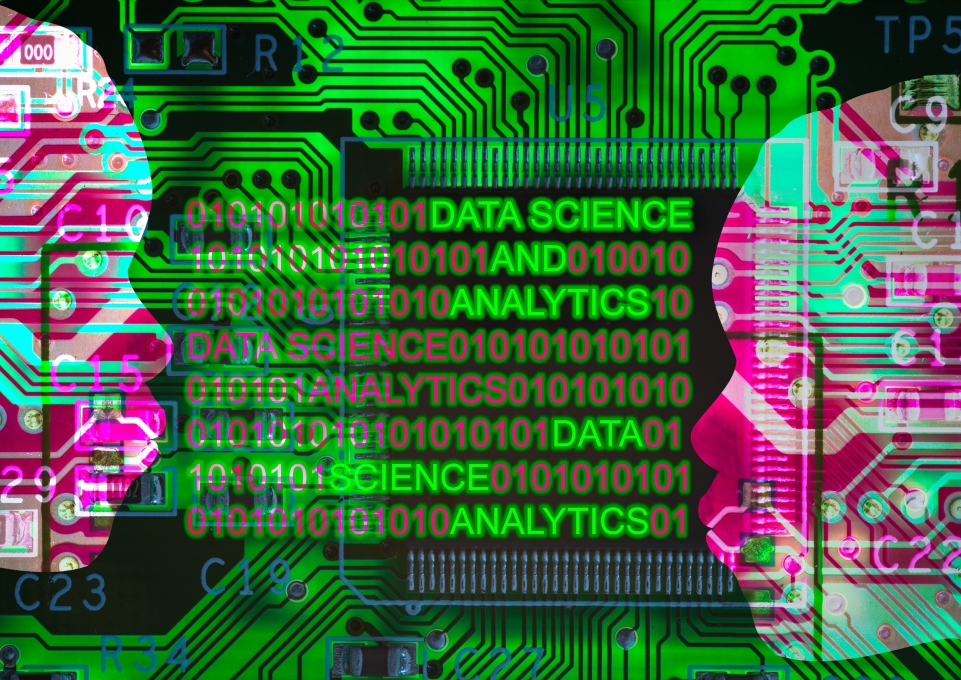 Stylized human profiles made to look like a circuit board