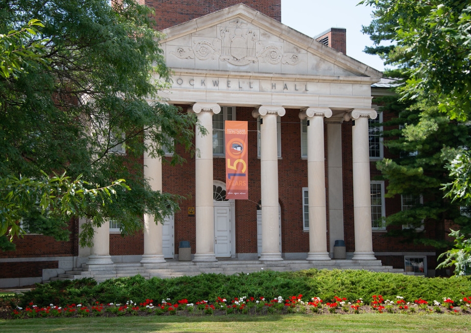 150 Anniversary Banner hanging on the front of Rockwell Hall