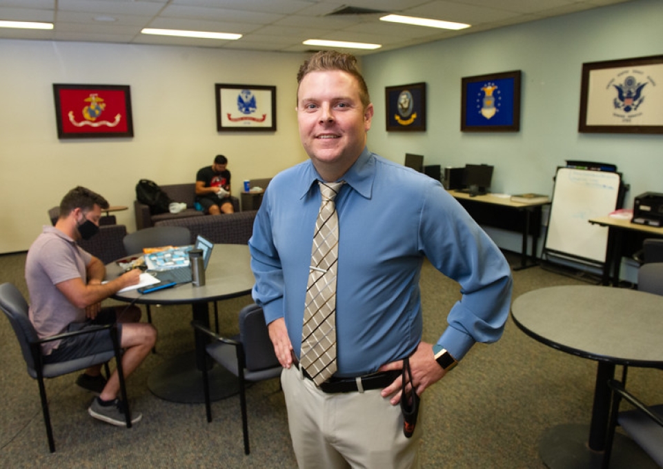 Bruce Baumgardener stands in the veterans student lounge