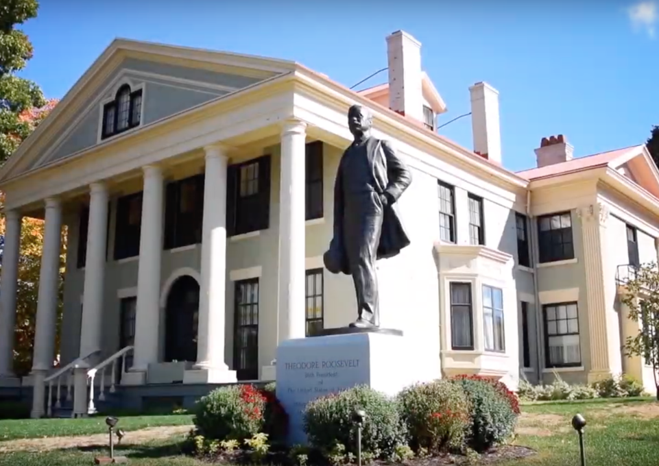 Exterior photo of the TR Inaugural Site with TR statue in front