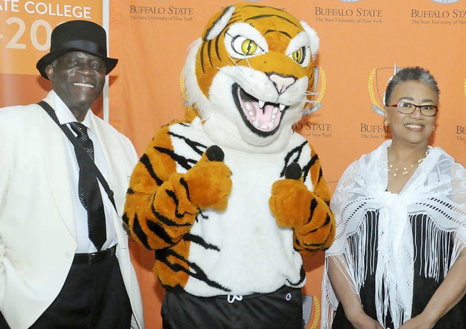 Alvin Turner and Kate Conway-Turner posing with Benji Bengal