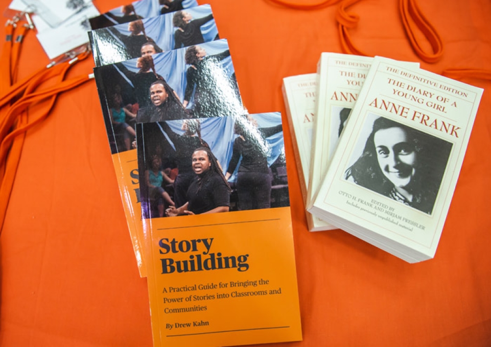Table disply of mulitple copies of "Anne Frank: The Diary of a Young Girl" and "Story Building" by Drew Kahn