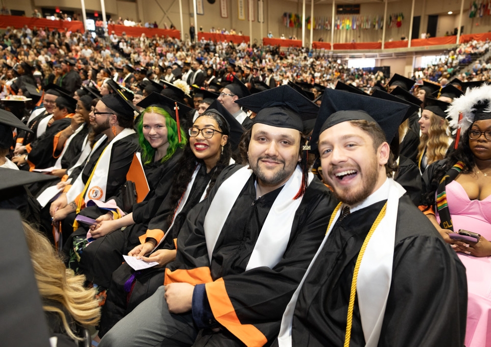 Group of graduates at commencement in the Sports Arena