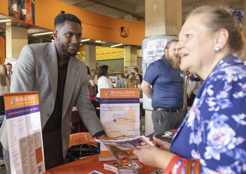 Attendees mingle at the event.